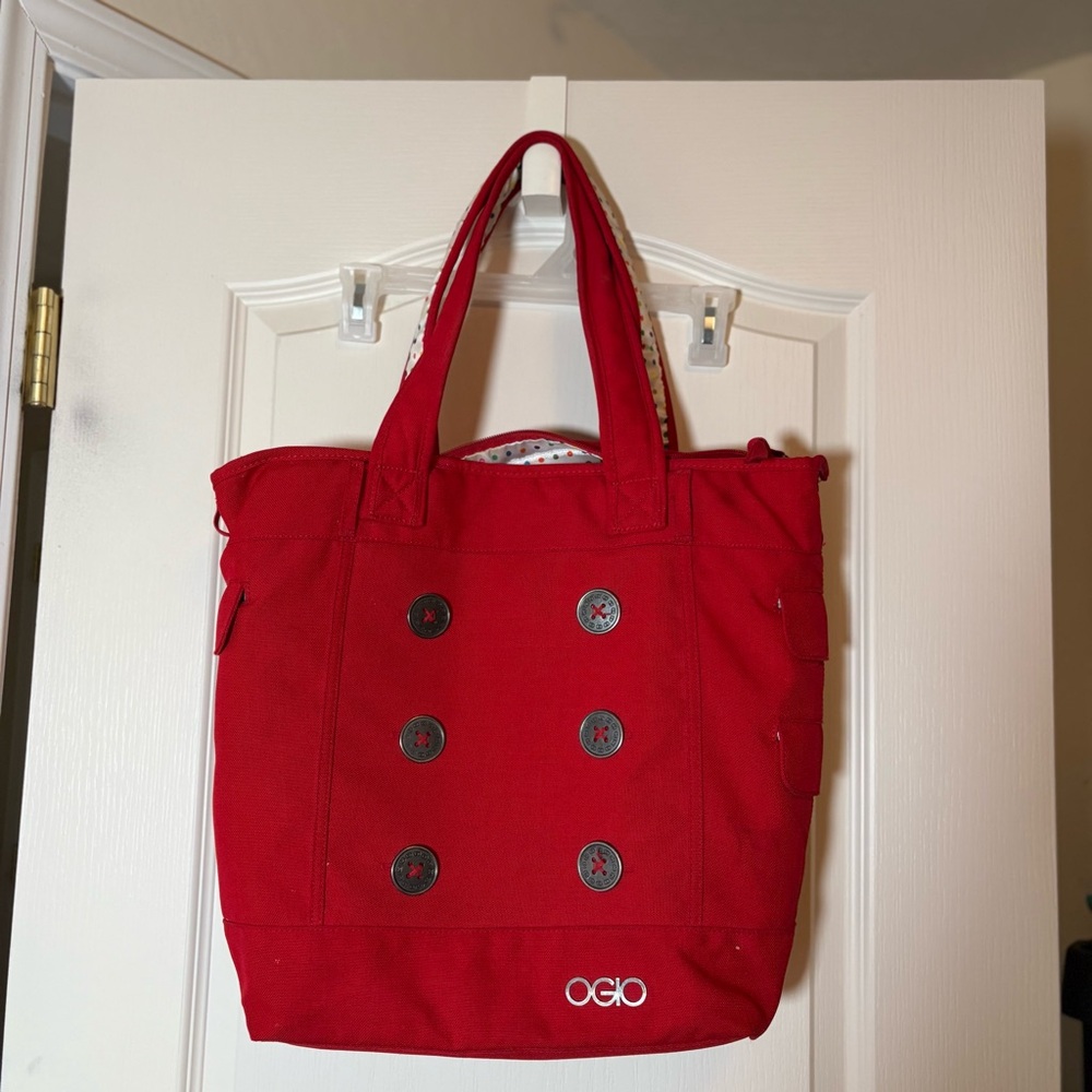 OGIO RED BAG WITH POLKA DOTS 14” X 14”. Preloved